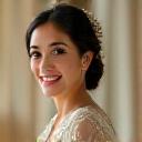 Photo of Ms. Sofia Reyes, a radiant bride wearing a stunning Filipiniana wedding gown.